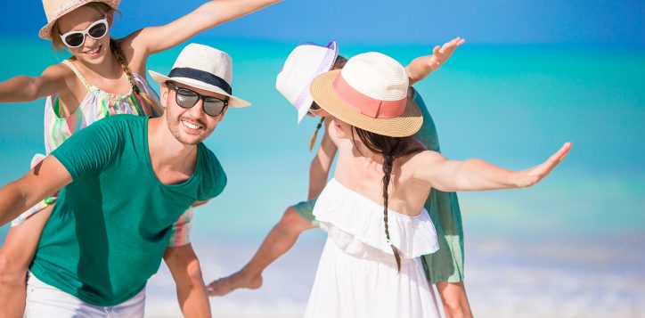 happy-family-with-kids-on-the-beach-2